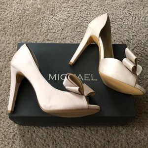 Champagne peep toe classy heels.